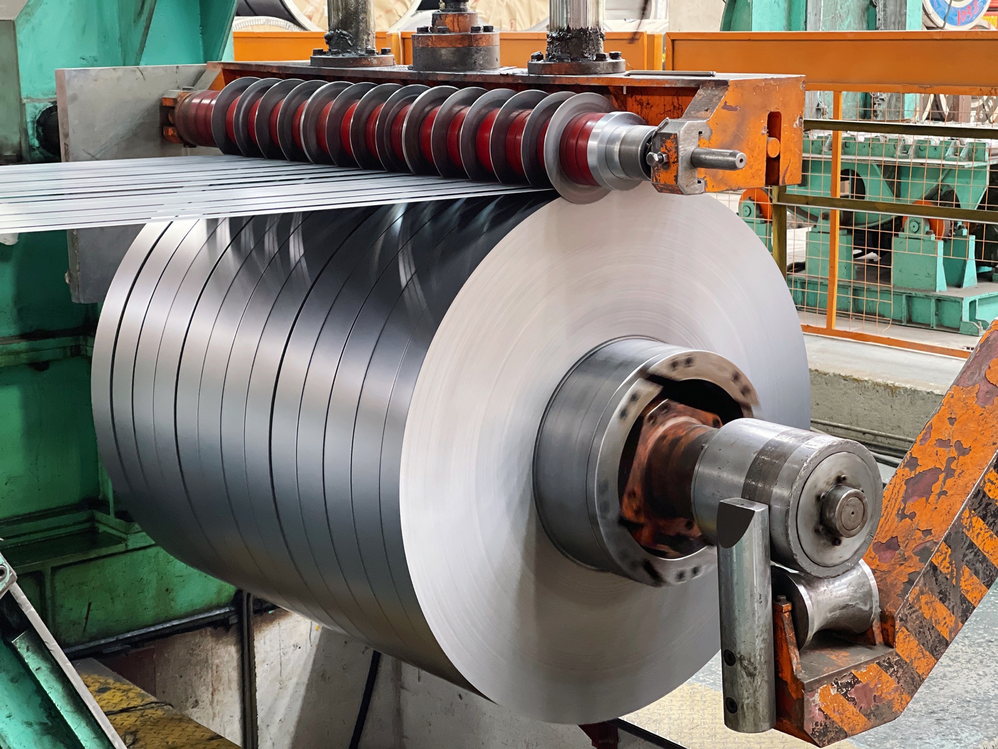 Precision steel coil slitting in progress